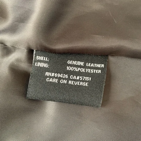 Genuine leather black moto jacket. Shiny silver hardware. Worn twice. Like new - Picture 3 of 3